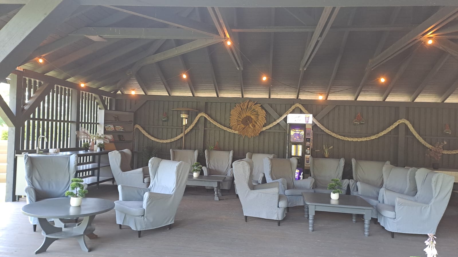 Gazebo lounge interior with wingback chairs